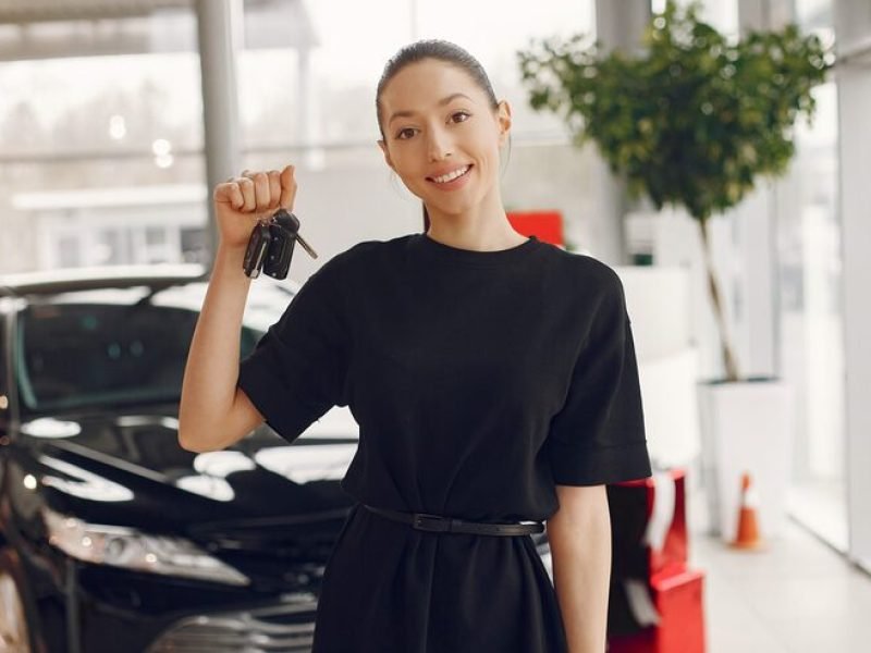 stylish-elegant-woman-car-salon_1157-32027