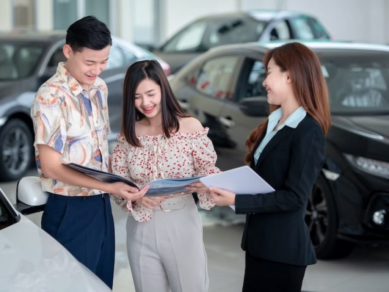 young-asian-lovers-are-happy-buy-new-car-dealer-buy-car-with-car-dealer_140555-223